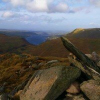 The summit of Steel Knotts with Ullswater beyond