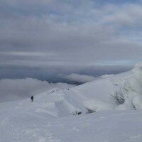 Descending from the summit of Snowdon in winter conditions