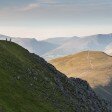 Walkers at the top of Swirral Edge