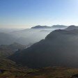The Coniston Fells with mist over Langdale